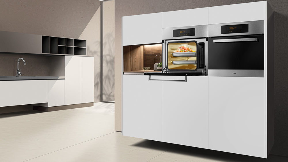 Built-in steam oven and convection oven installed in a white kitchen cabinet