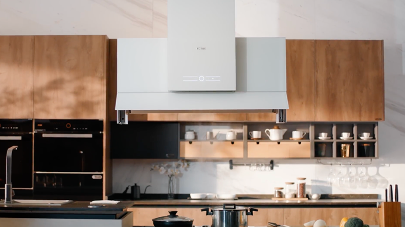 The World’s First Intelligent Self-Adjusting Island Range Hood