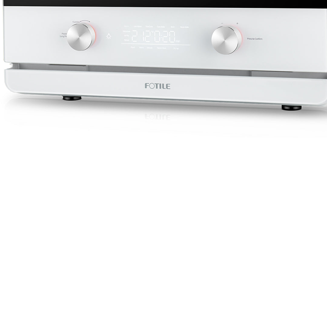 Close-up of a modern kitchen appliance labeled "FOTILE" in the lower center. This multifunctional countertop oven, known as the Combi Steam Oven, boasts a sleek white design with a digital display, two round knobs on either side, and an overall minimalist aesthetic.